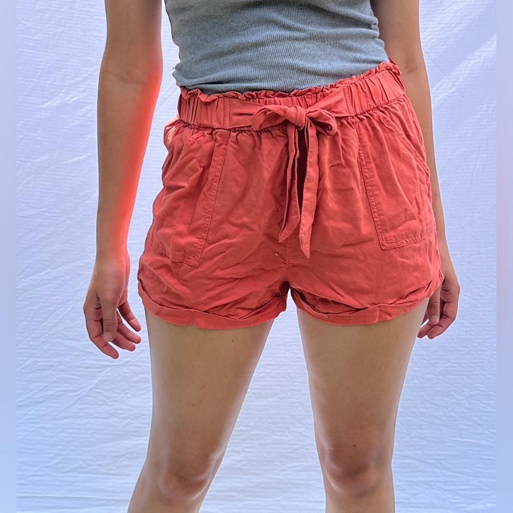 Pink, high-waisted, flowy, beach shorts with tie